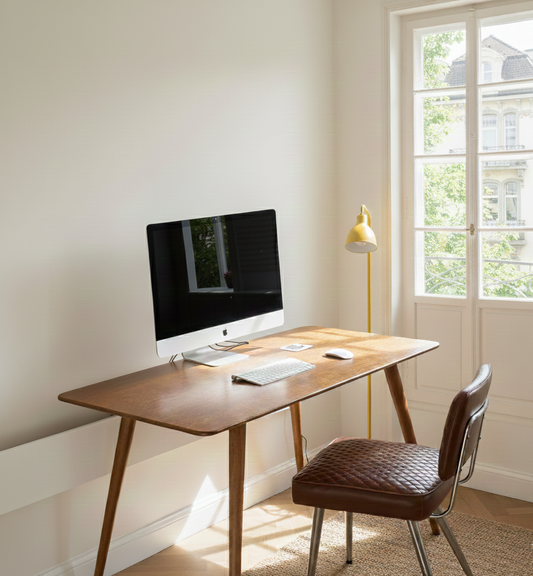 Office with wooden table and chair